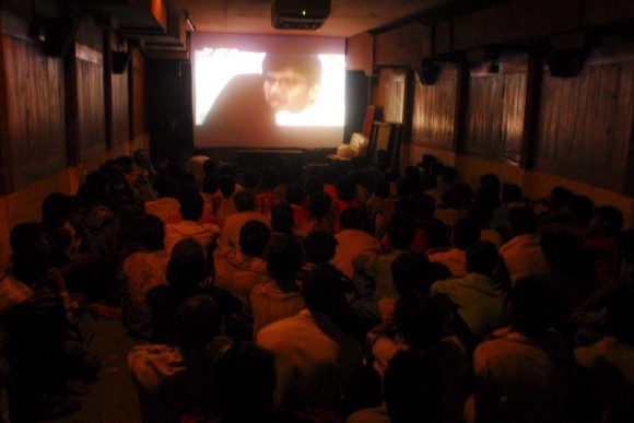 Dharavi: unlicensed movie theatre audience